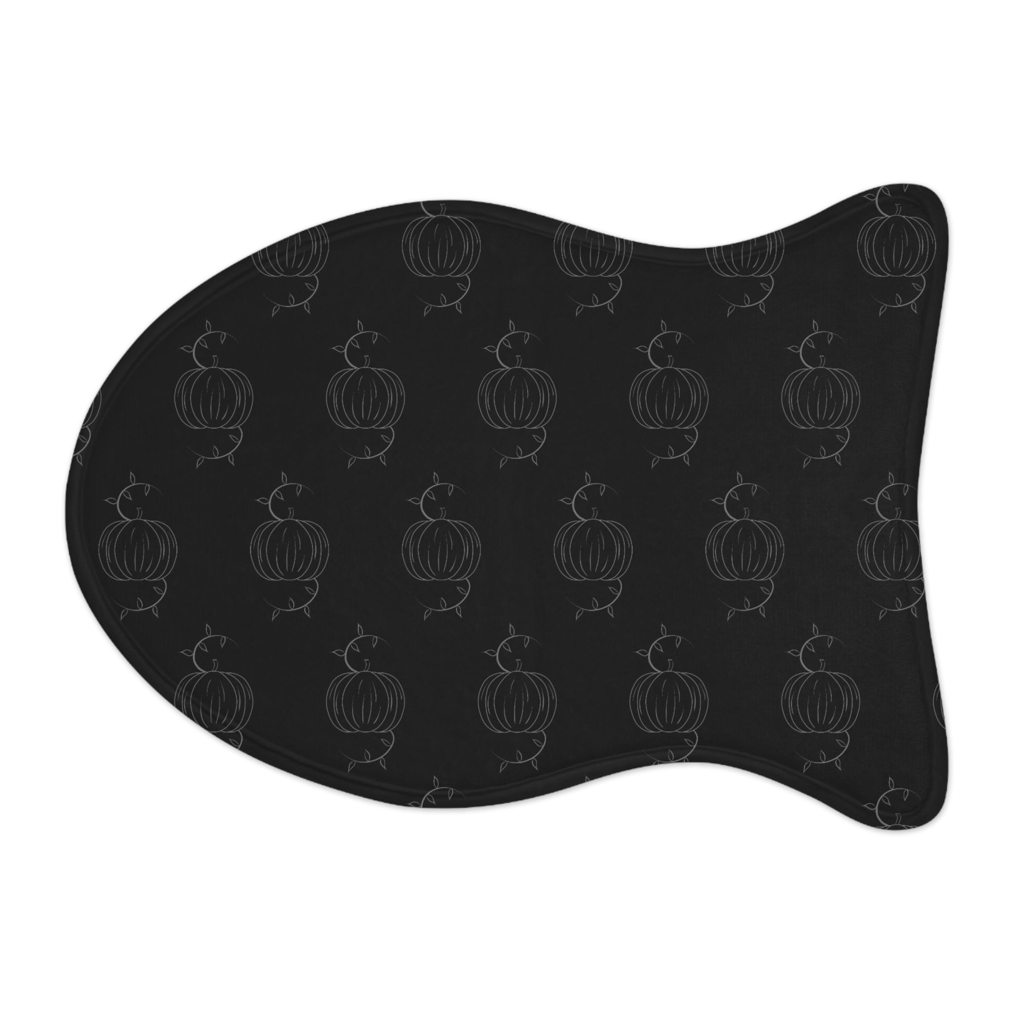 Black pet feeding mat with pumpkin pattern, curved bone shape