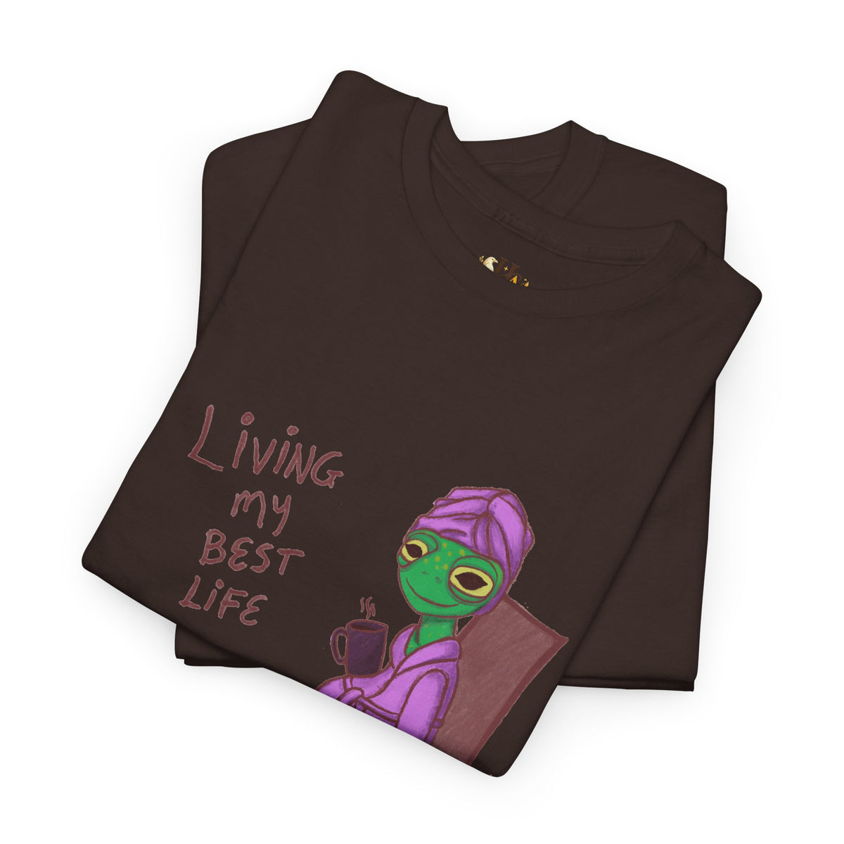 Dark brown graphic t-shirt with “Living my Best Life” text and character illustration