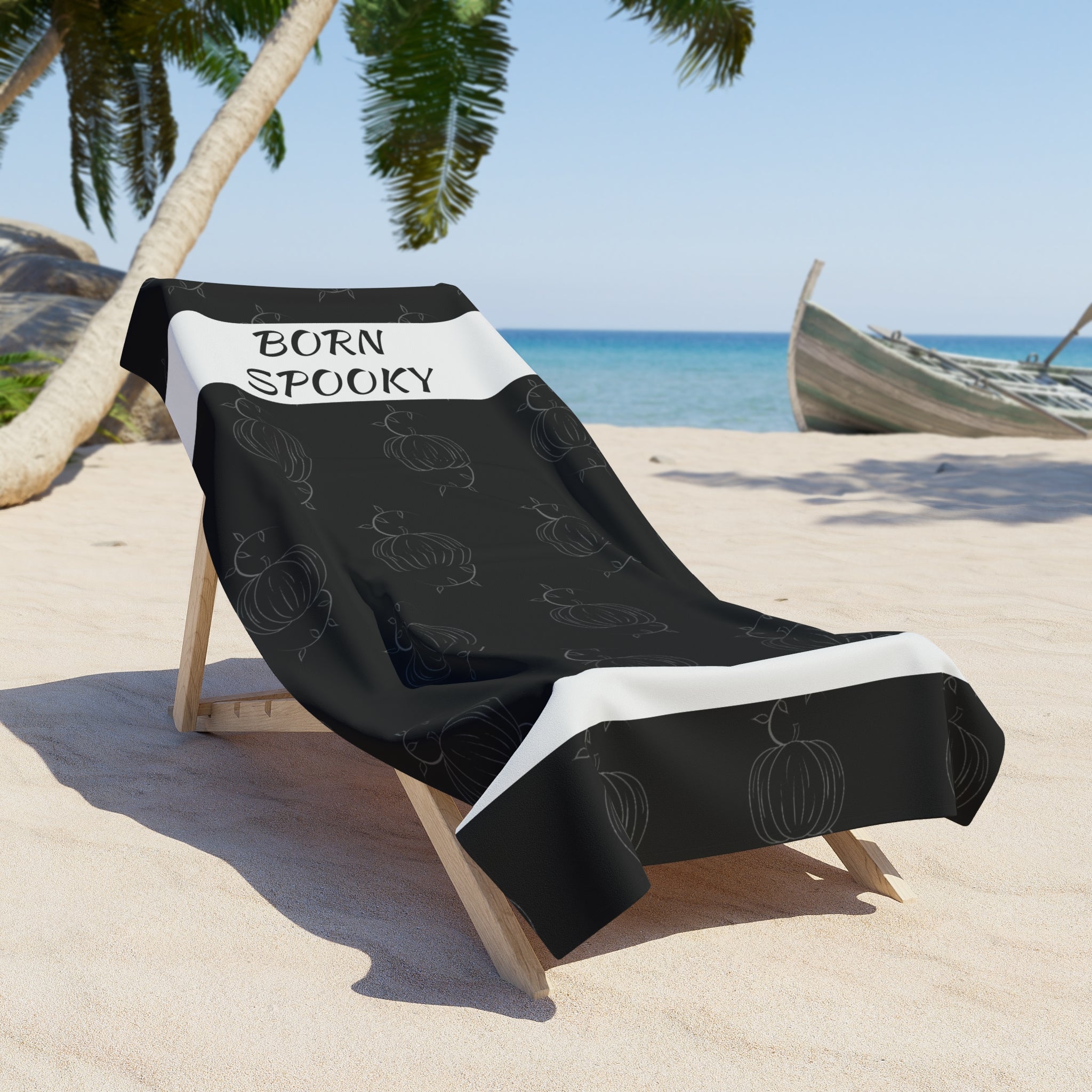 Black towel with white edges draped on chair, &