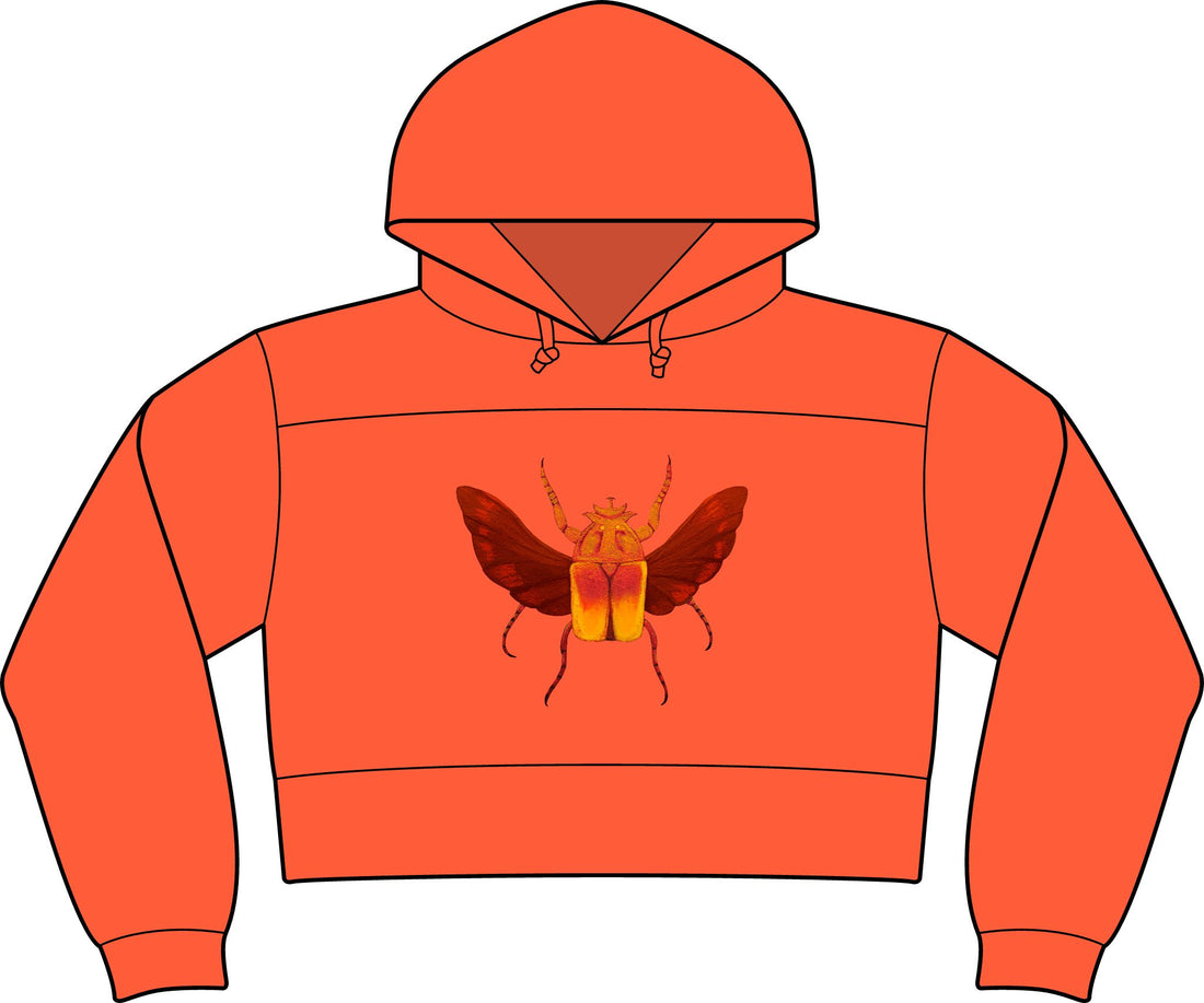 Cropped fleece hooded sweatshirt in orange-red, featuring insect graphic and front pocket.