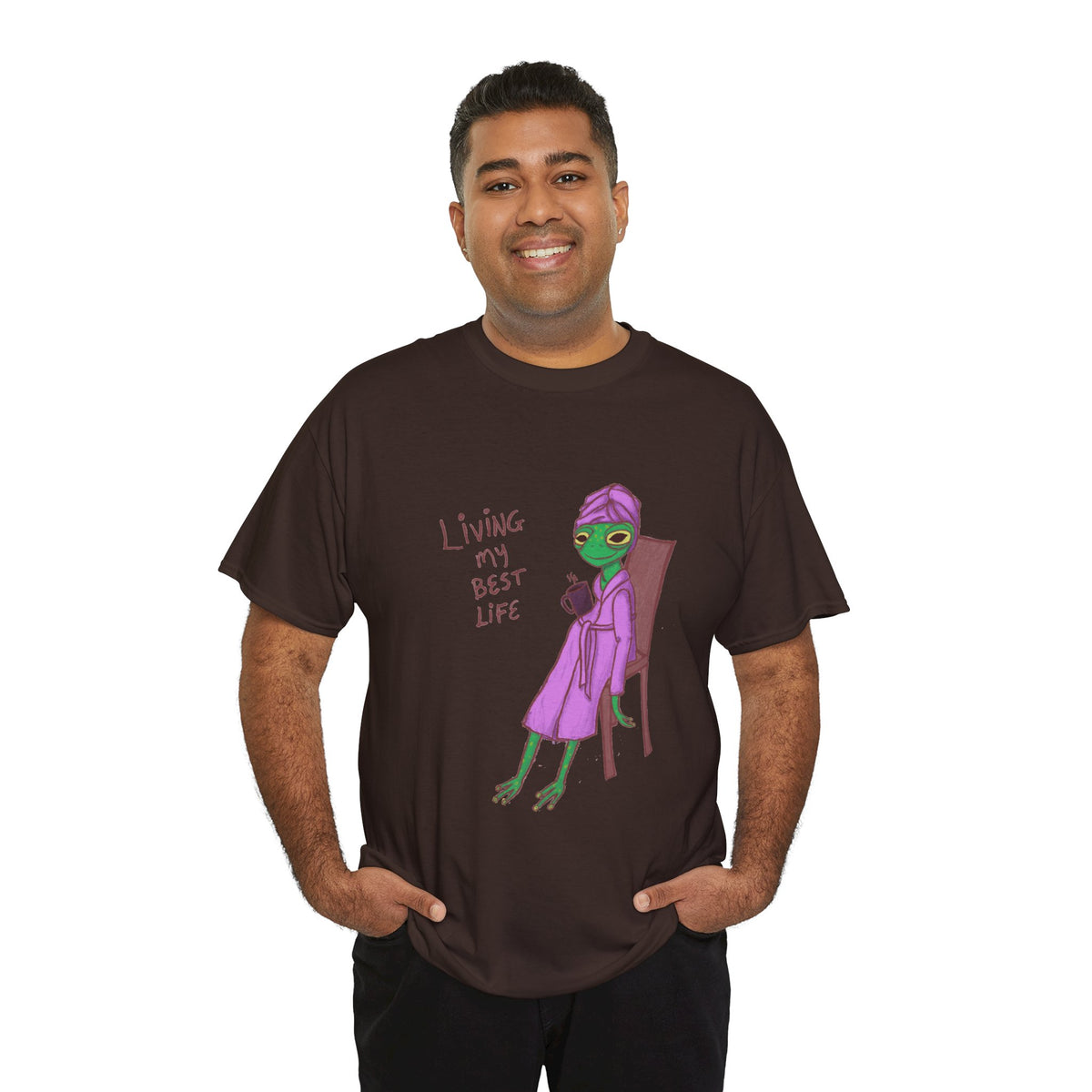 Dark brown graphic t-shirt on model featuring “Living my Best Life” character art