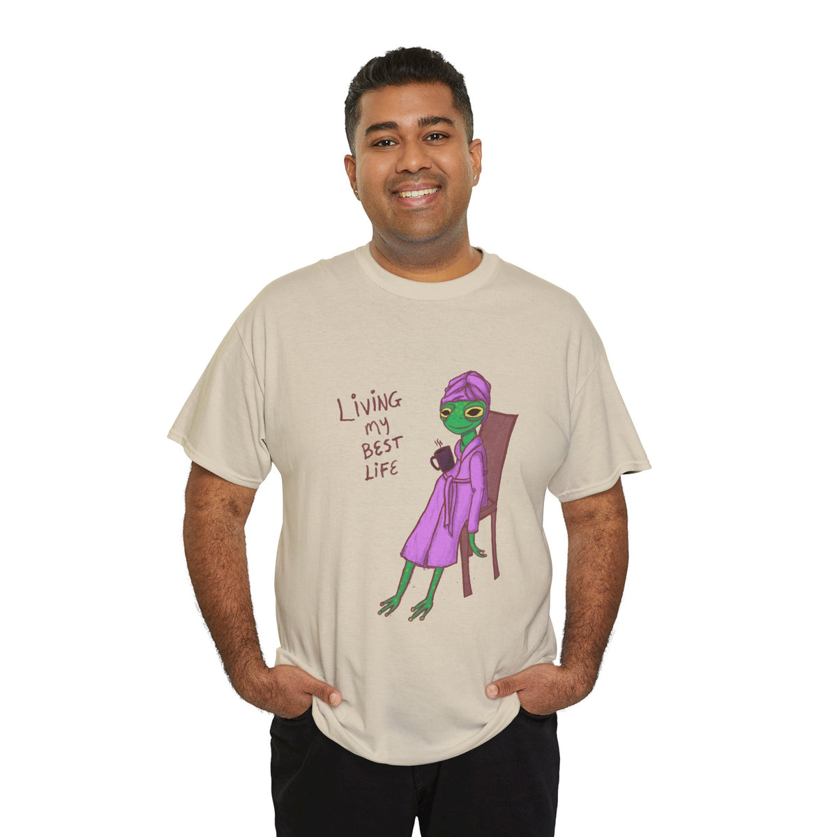 Light tan graphic crew-neck T-shirt with colorful character and “Living my Best Life”