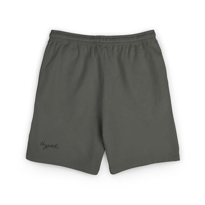 Dark gray sweat shorts with elastic waistband and small “Hypedi” text logo