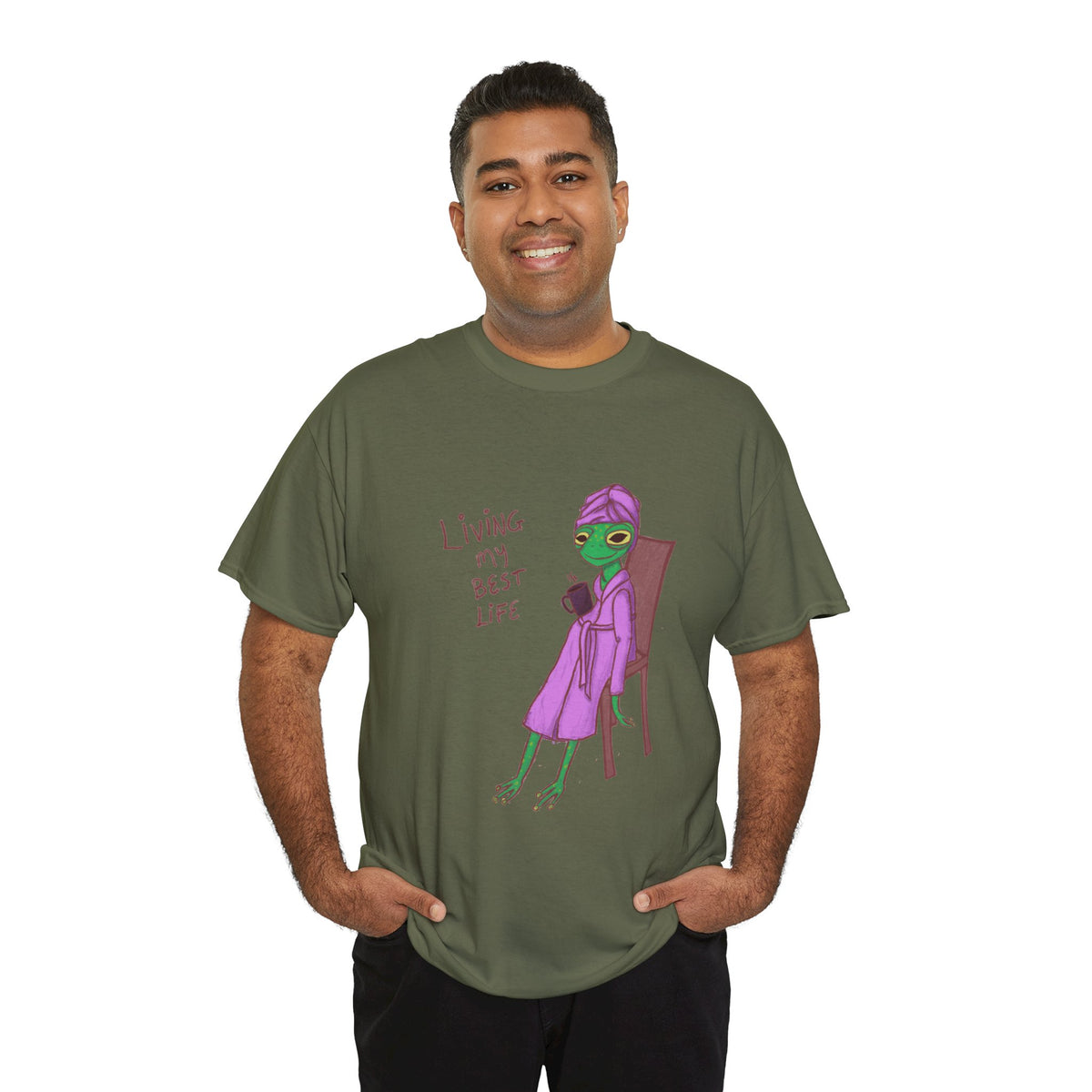 Dark green short-sleeve graphic t-shirt worn by man, purple character design