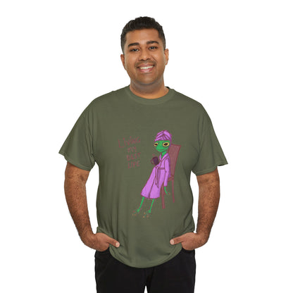 Dark green short-sleeve graphic t-shirt worn by man, purple character design