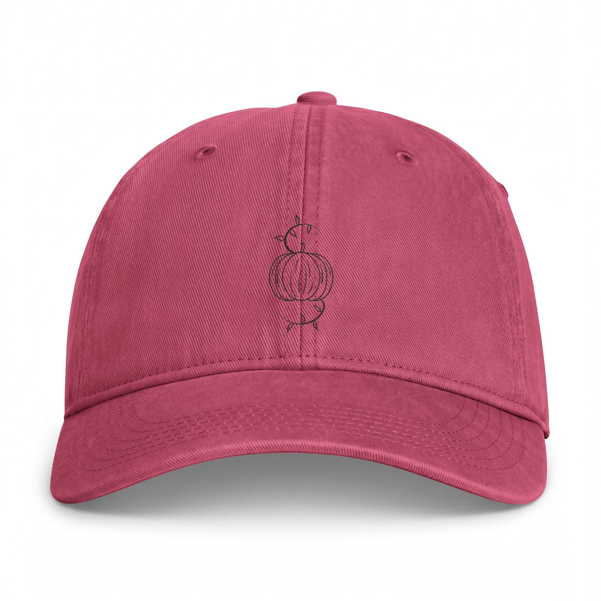 Washed baseball cap in dusty rose with embroidered pumpkin on front