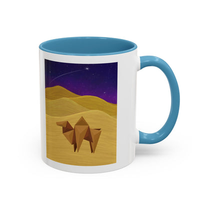 White coffee mug with light blue rim and handle, desert-night camel graphic on front