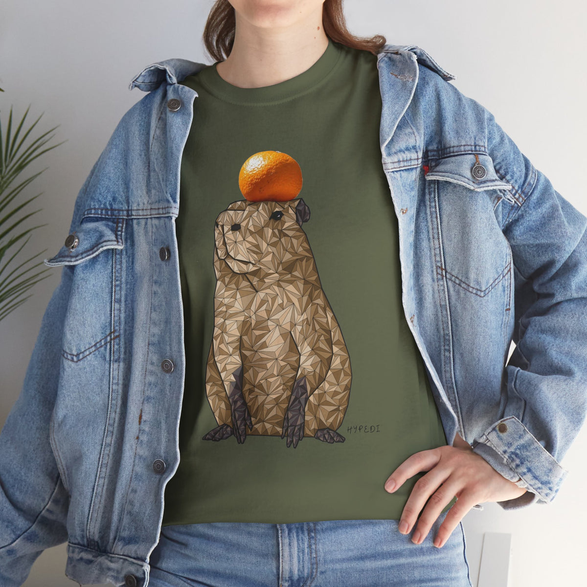 Olive green unisex cotton T-shirt with capybara graphic under denim jacket