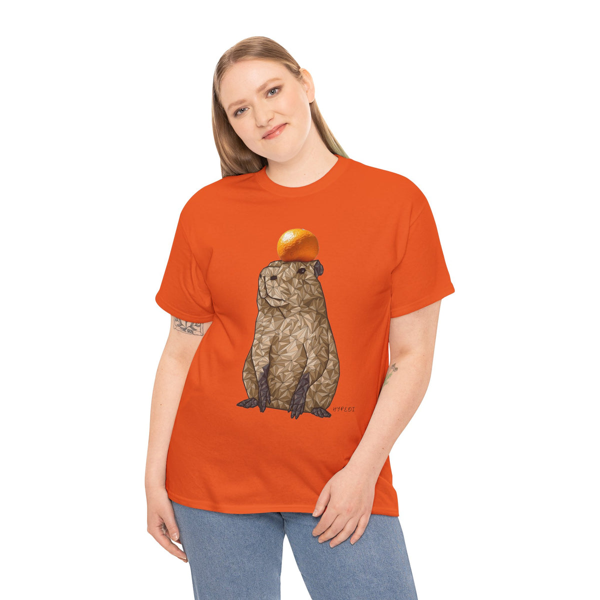 Unisex orange crewneck t-shirt with centered polygon capybara and orange fruit graphic
