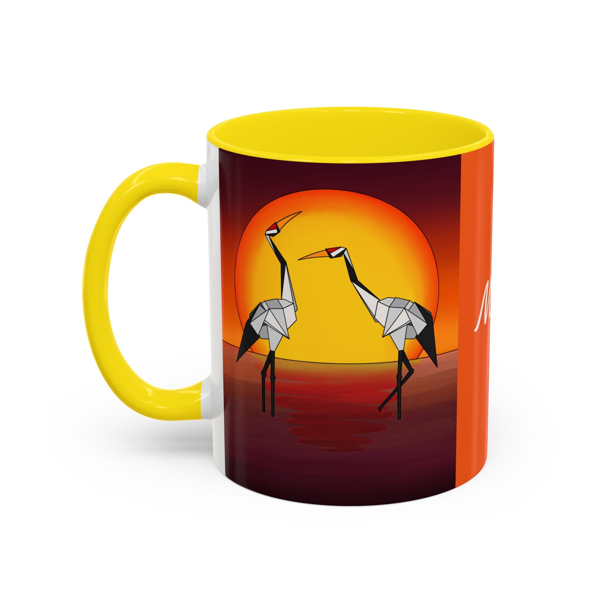 Yellow coffee mug with origami crane artwork under a yellow sun, with left-side handle