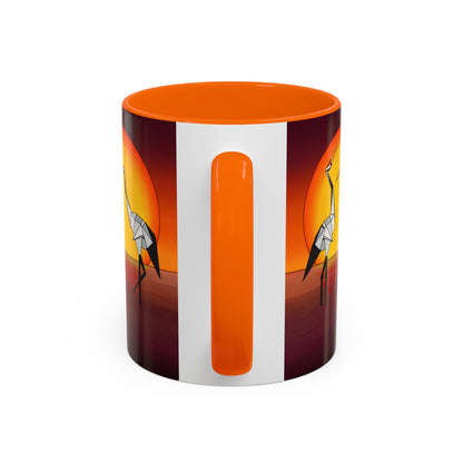 Orange coffee mug with origami crane side art and vertical orange stripe on white panel