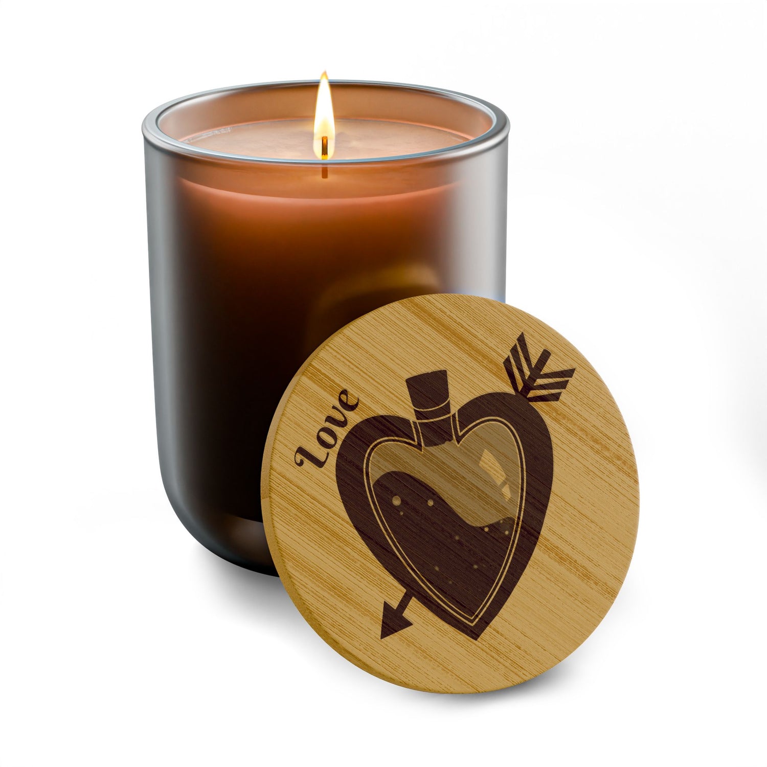 Brown soy candle with lit wick and round engraved wooden lid with heart design.