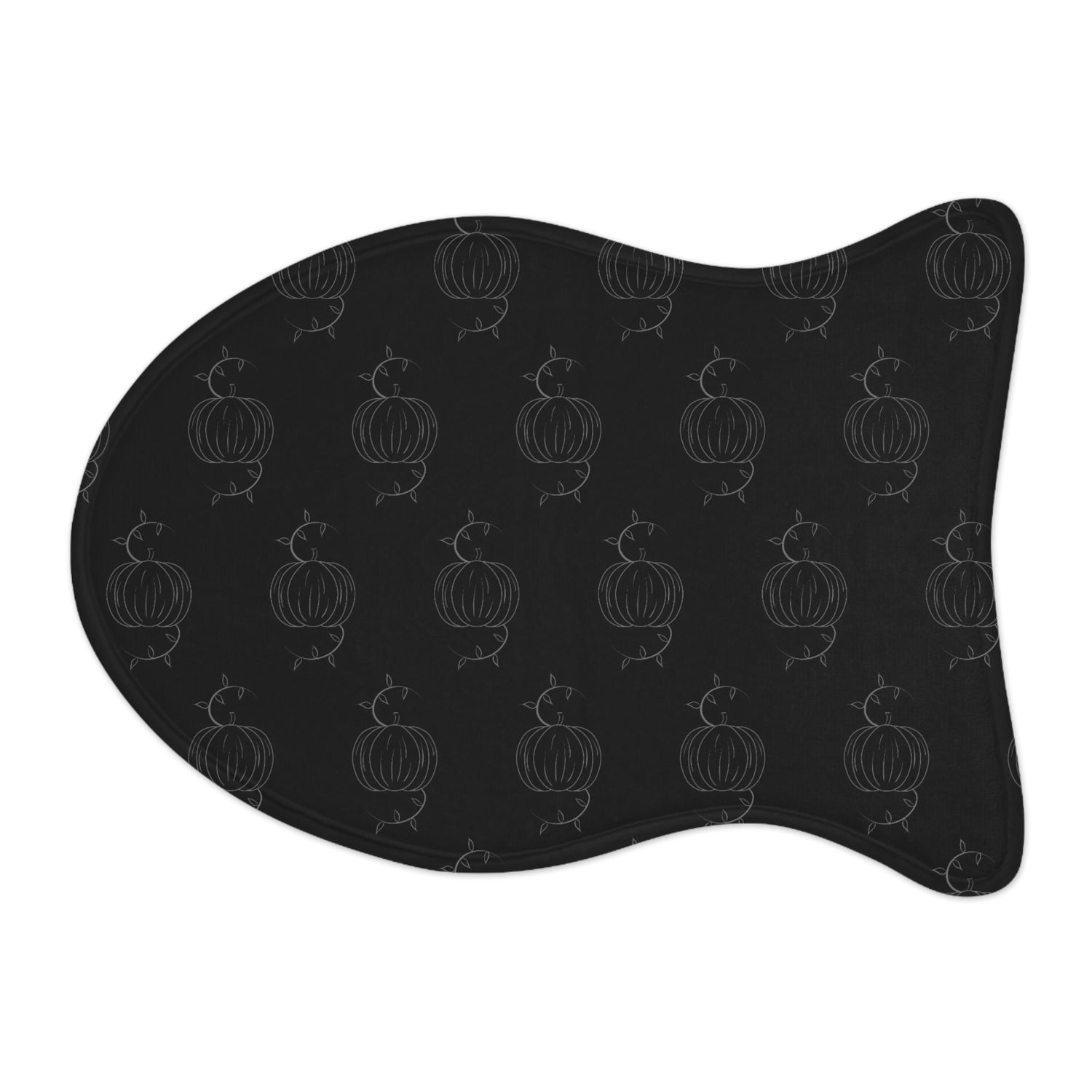 Black pet feeding mat with pumpkin pattern, curved bone shape