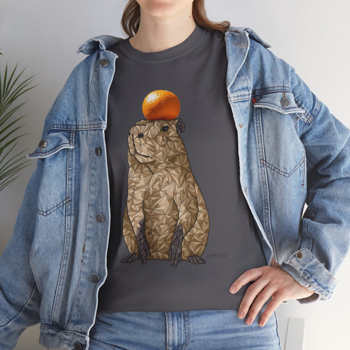 Dark charcoal unisex crewneck T-shirt with orange-capped capybara graphic