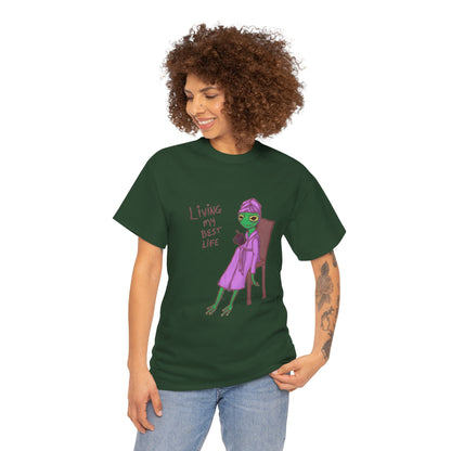 Dark green short-sleeve graphic t-shirt worn by woman, purple character and red text