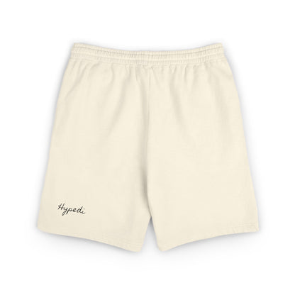 Ivory sweat shorts with elastic waistband and small “Hypedi” text logo