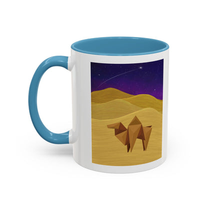 Coffee mug with blue handle and rim, white body, origami camel desert night sky print