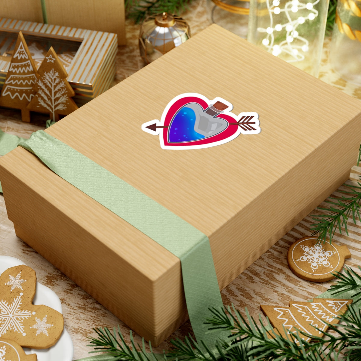 Heart potion sticker on a wrapped gift box with green ribbon and festive decor
