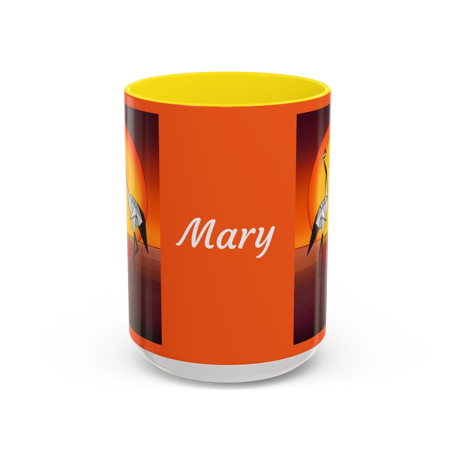 Orange coffee mug with yellow lid, “Mary” text and origami crane artwork on sides