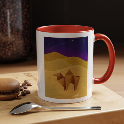 White coffee mug with red rim and handle, desert-night camel graphic on front