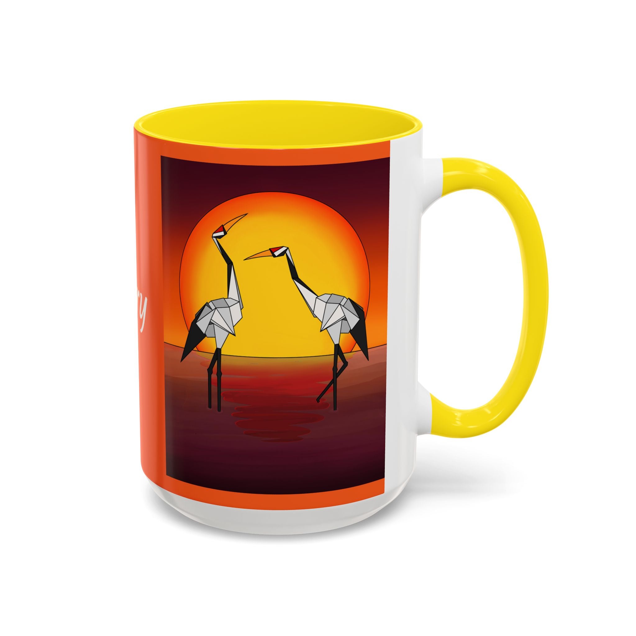 Yellow coffee mug with origami crane sunset print and yellow handle, front view.