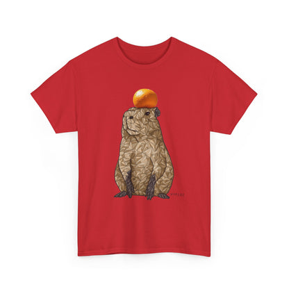 Red unisex T-shirt with centered capybara graphic holding an orange