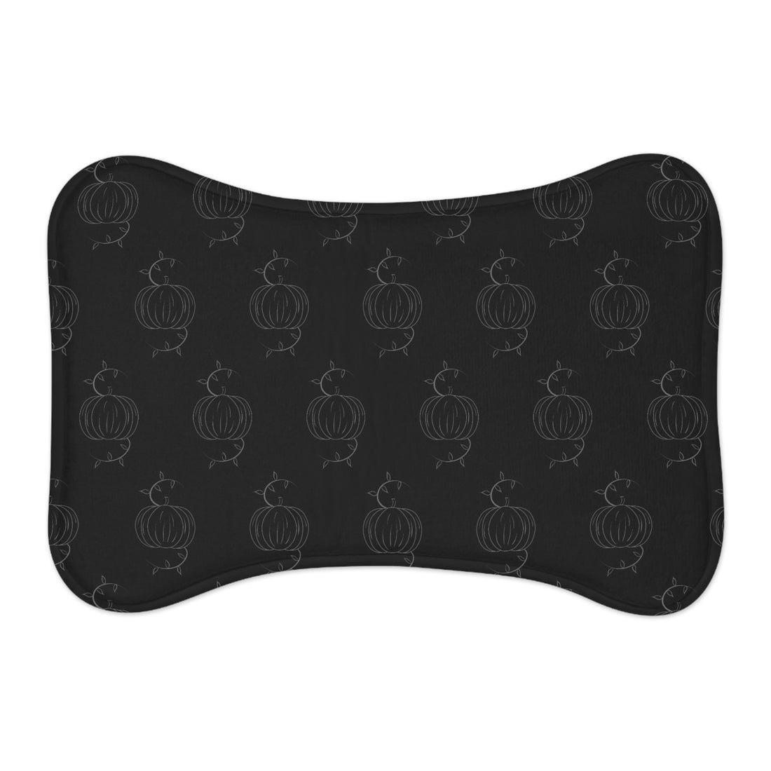 Black pet feeding mat with pumpkin outline pattern, rounded bone shape