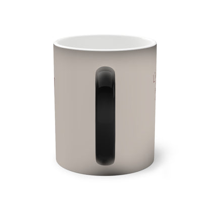 Color-changing mug with glossy black color-change panel in center