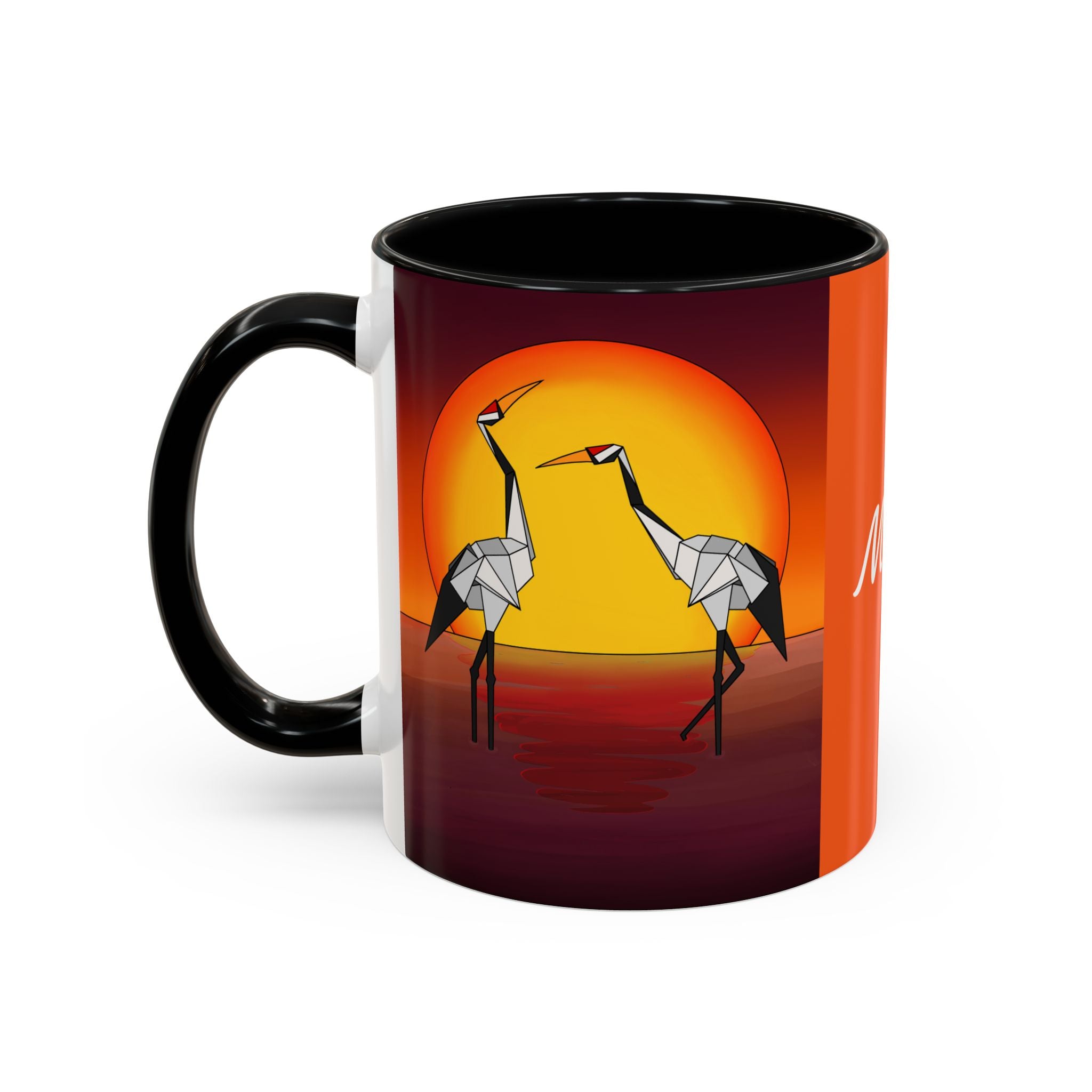 Orange coffee mug with black handle, origami crane artwork and circular sunset graphic