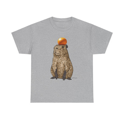 Light gray unisex T-shirt with capybara holding an orange graphic on front