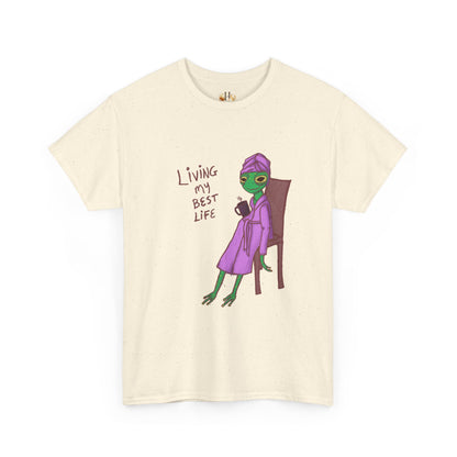 Cream graphic t-shirt with purple alien-girl character and red &
