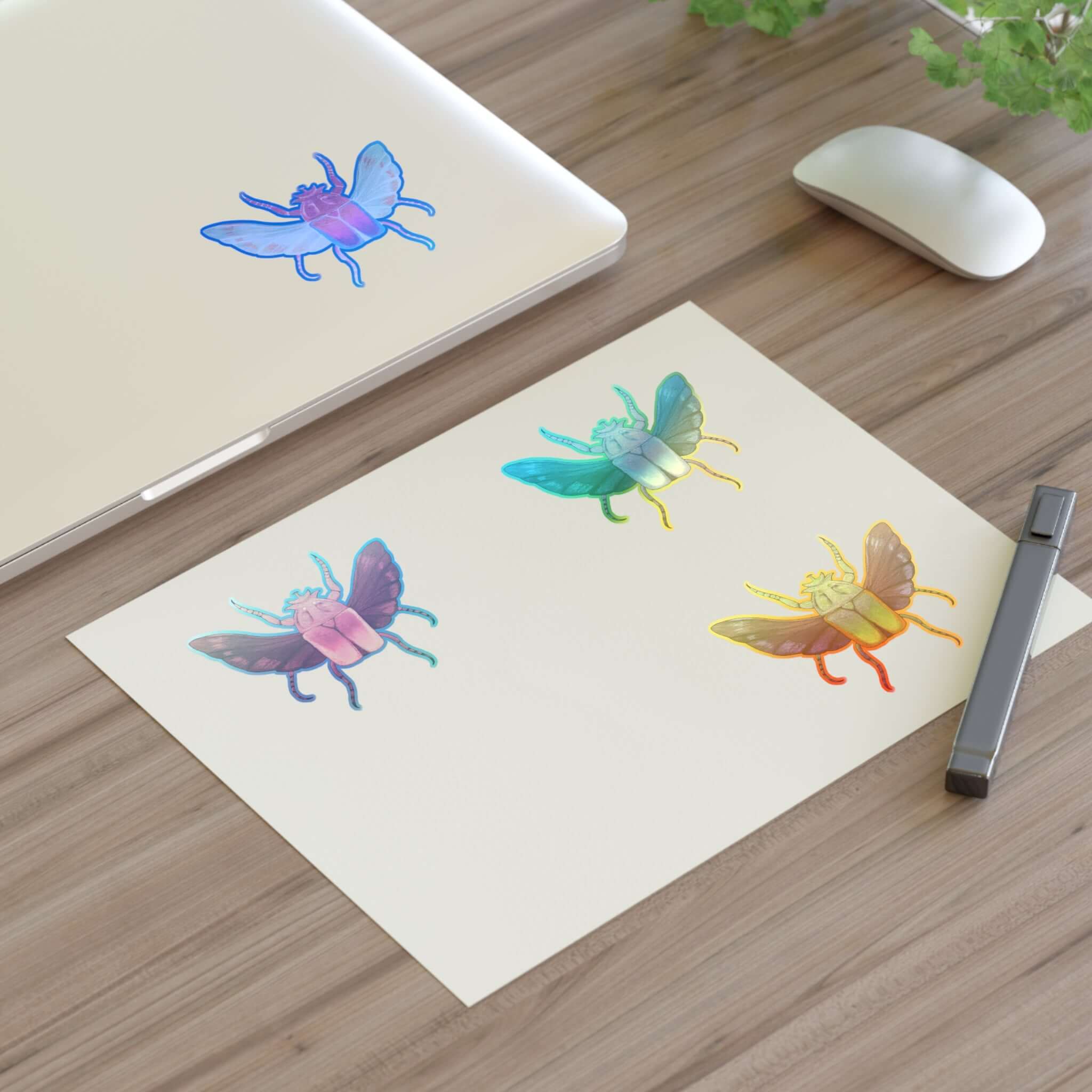 Holographic die-cut sticker sheet with three colorful butterfly stickers on a white page