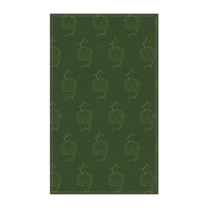 Green pumpkin pattern tea towel, vertical rectangle with stitched border