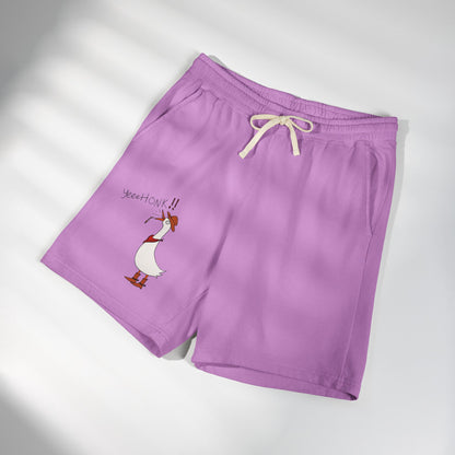 Purple sweat shorts with cream drawstring and cartoon duck graphic on left leg