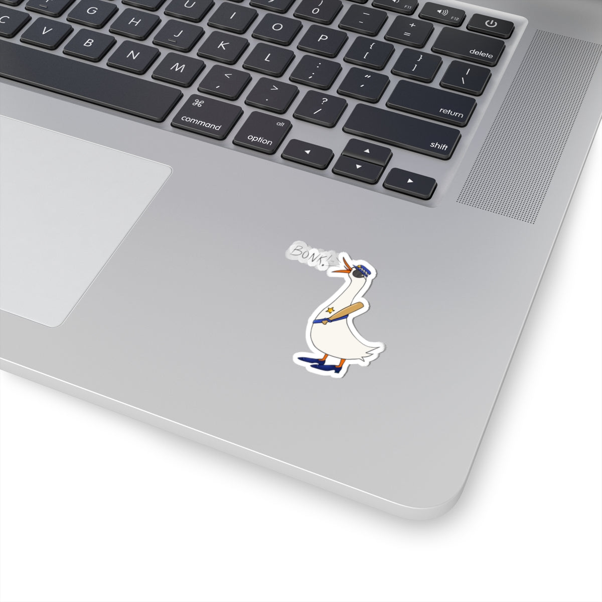 White kiss-cut sticker with cartoon goose and “BONK” text