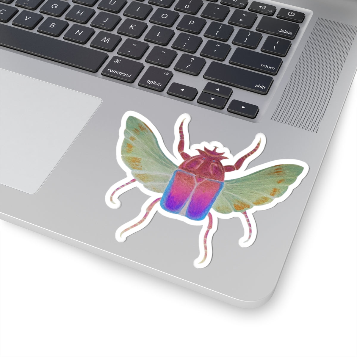 Iridescent beetle kiss-cut sticker with iridescent purple and teal coloring and white outline
