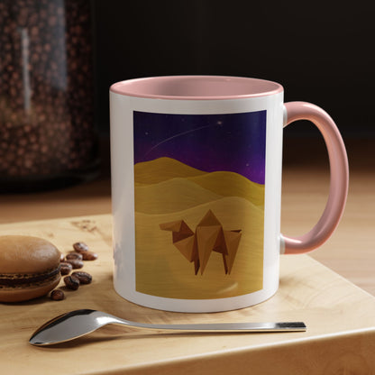 White coffee mug with pink rim and handle, desert-night camel graphic on the front