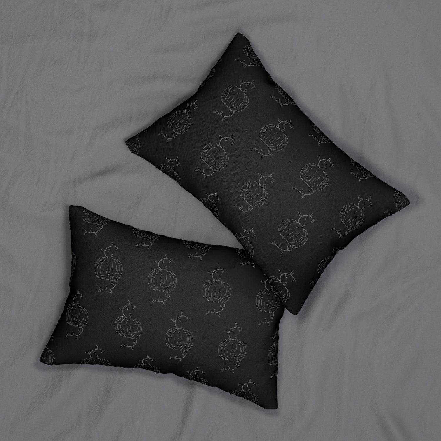 Set of two black lumbar pillows with pumpkin line pattern