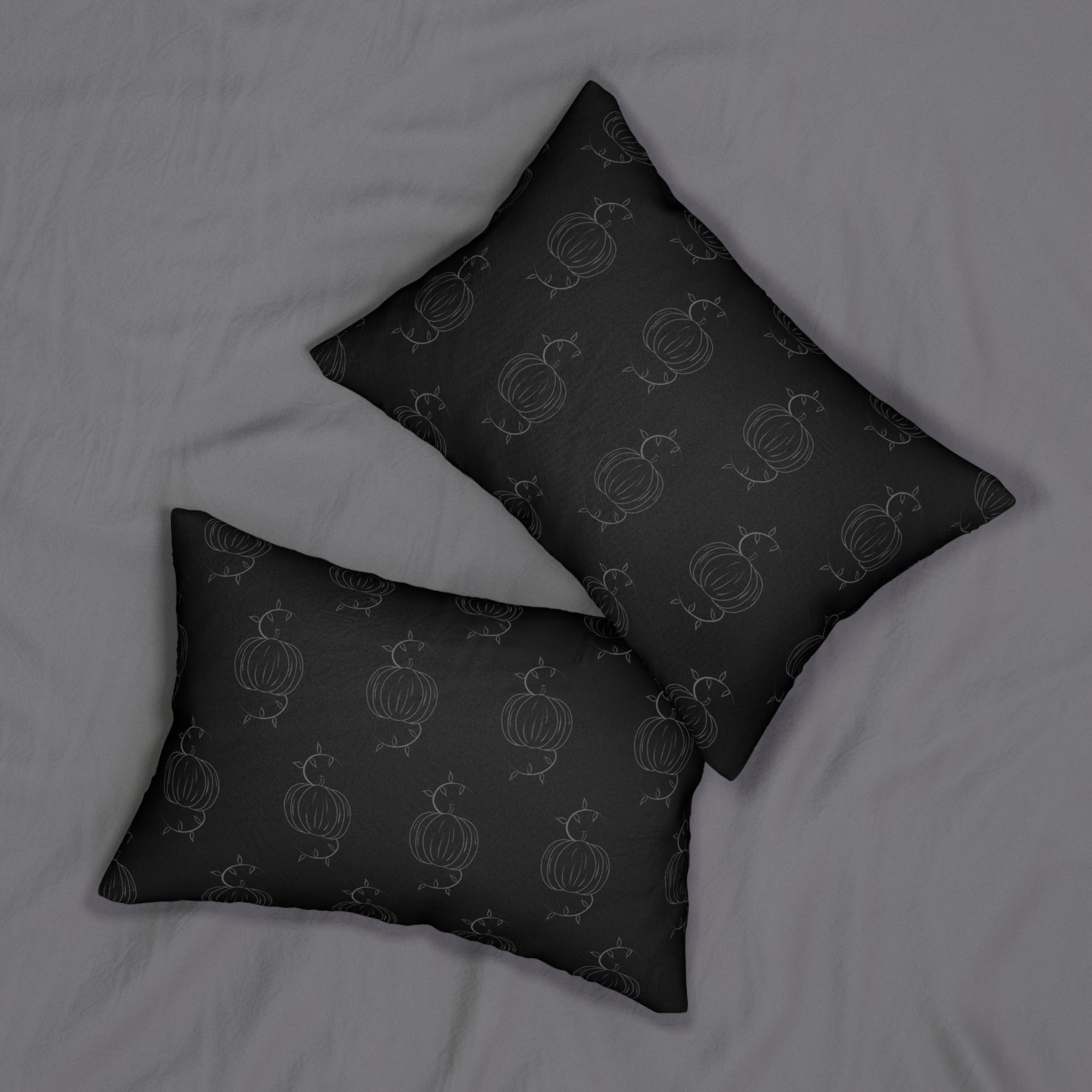 Set of two black lumbar pillows with pumpkin line pattern