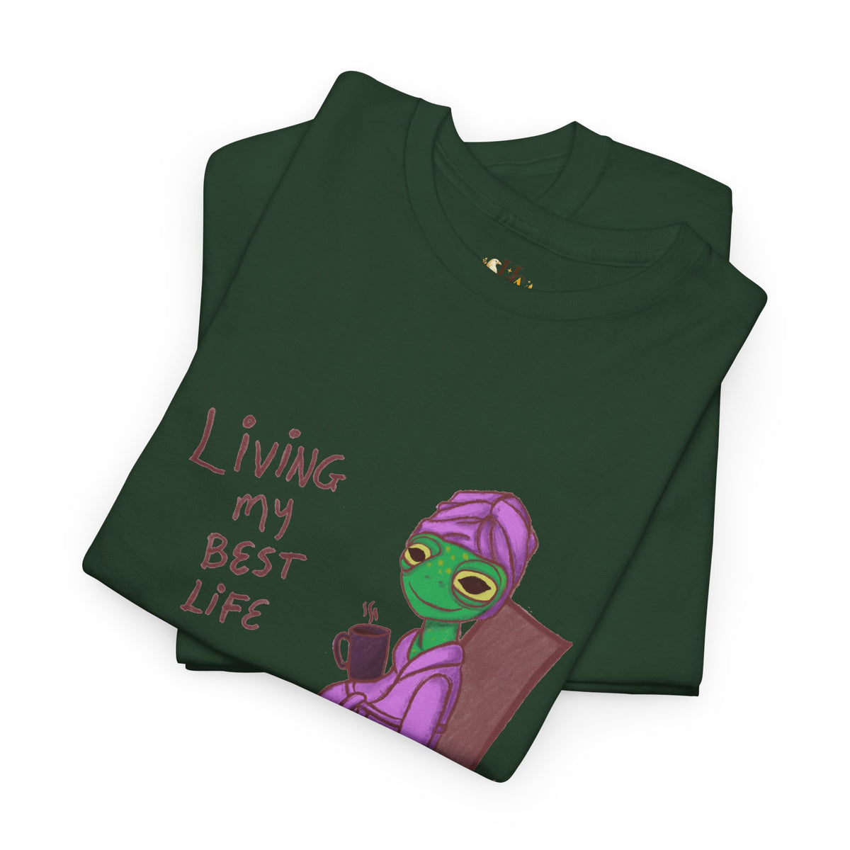 Dark green graphic t-shirt with purple character and red text “Living my Best Life”