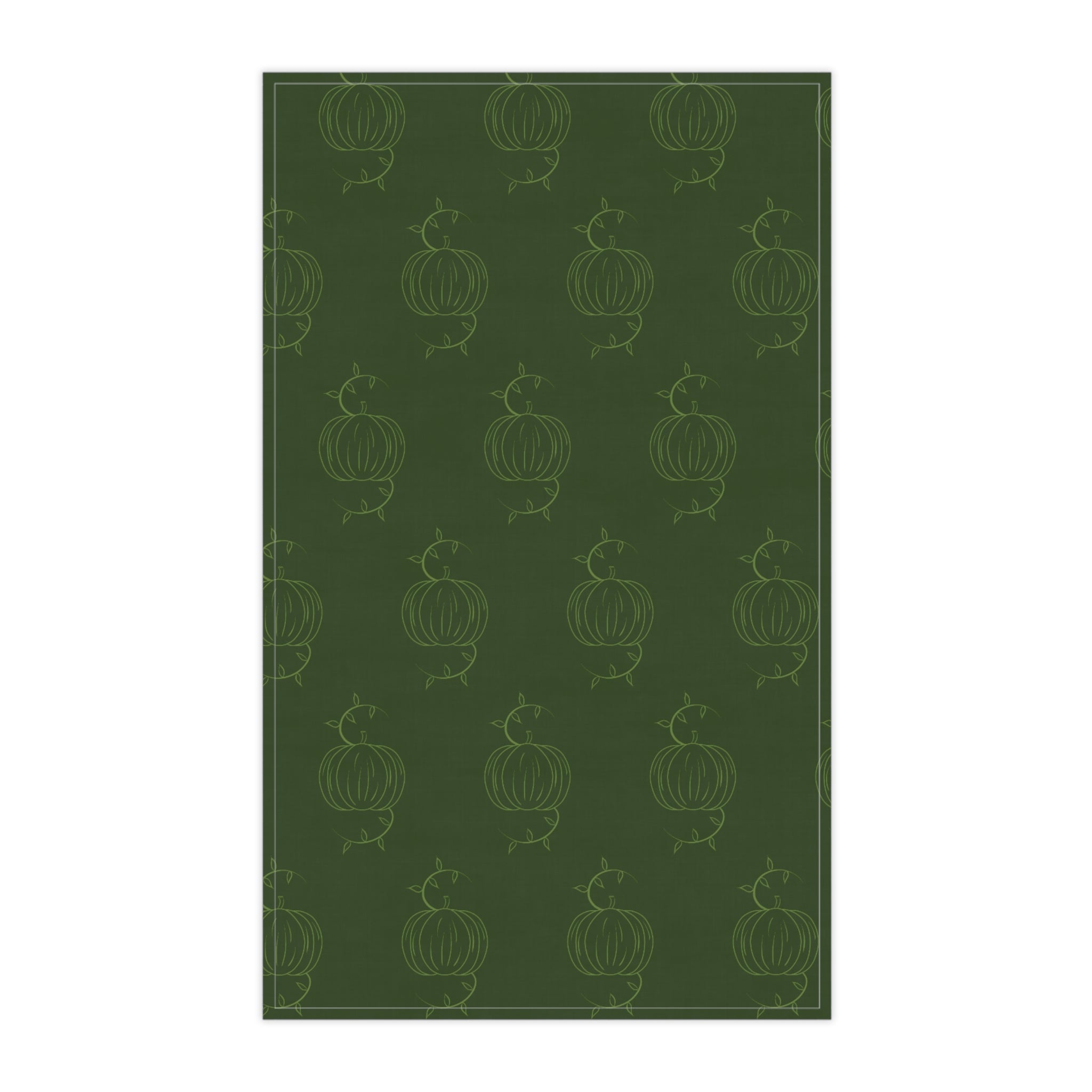 Green tea towel with repeating pumpkin outlines, vertical rectangle view