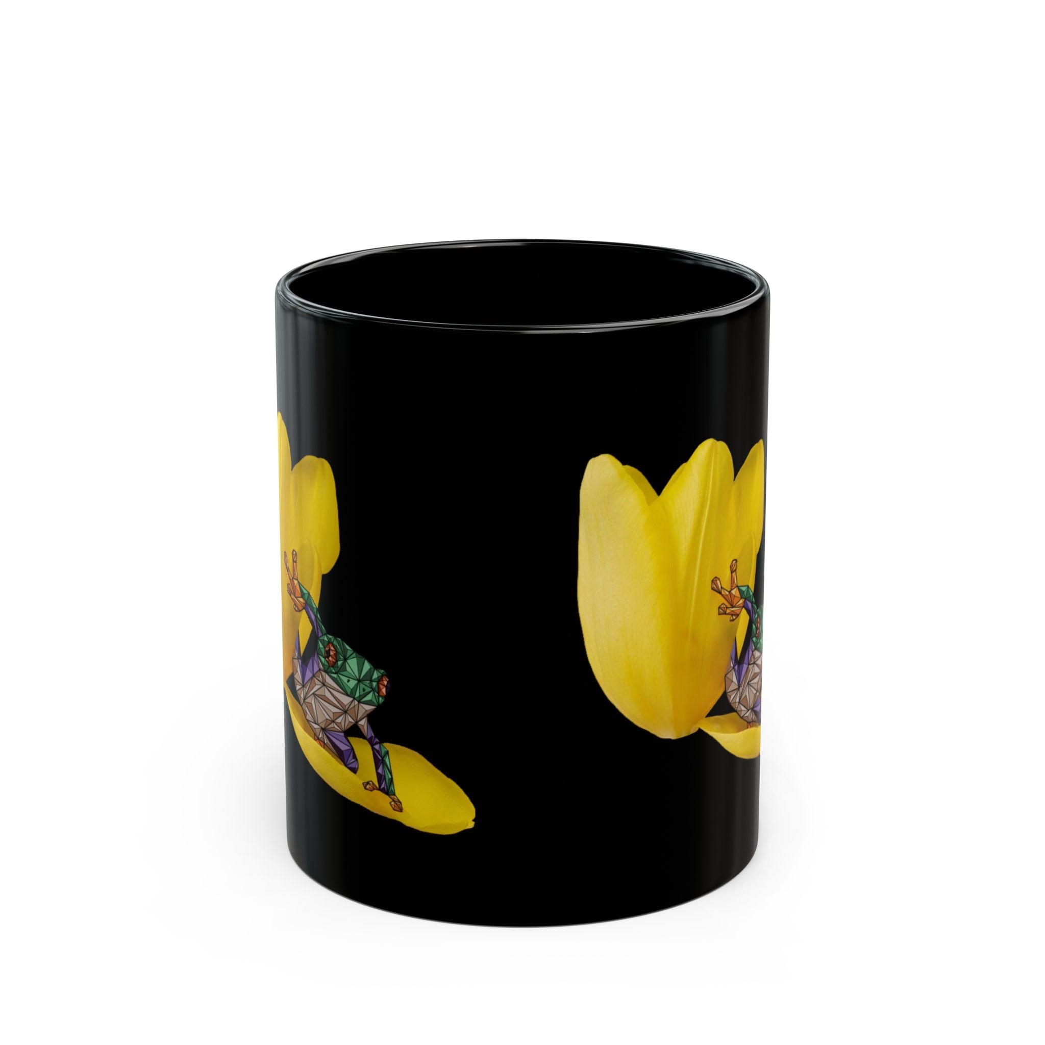 Black ceramic mug showing yellow tulip and frog graphic on the side