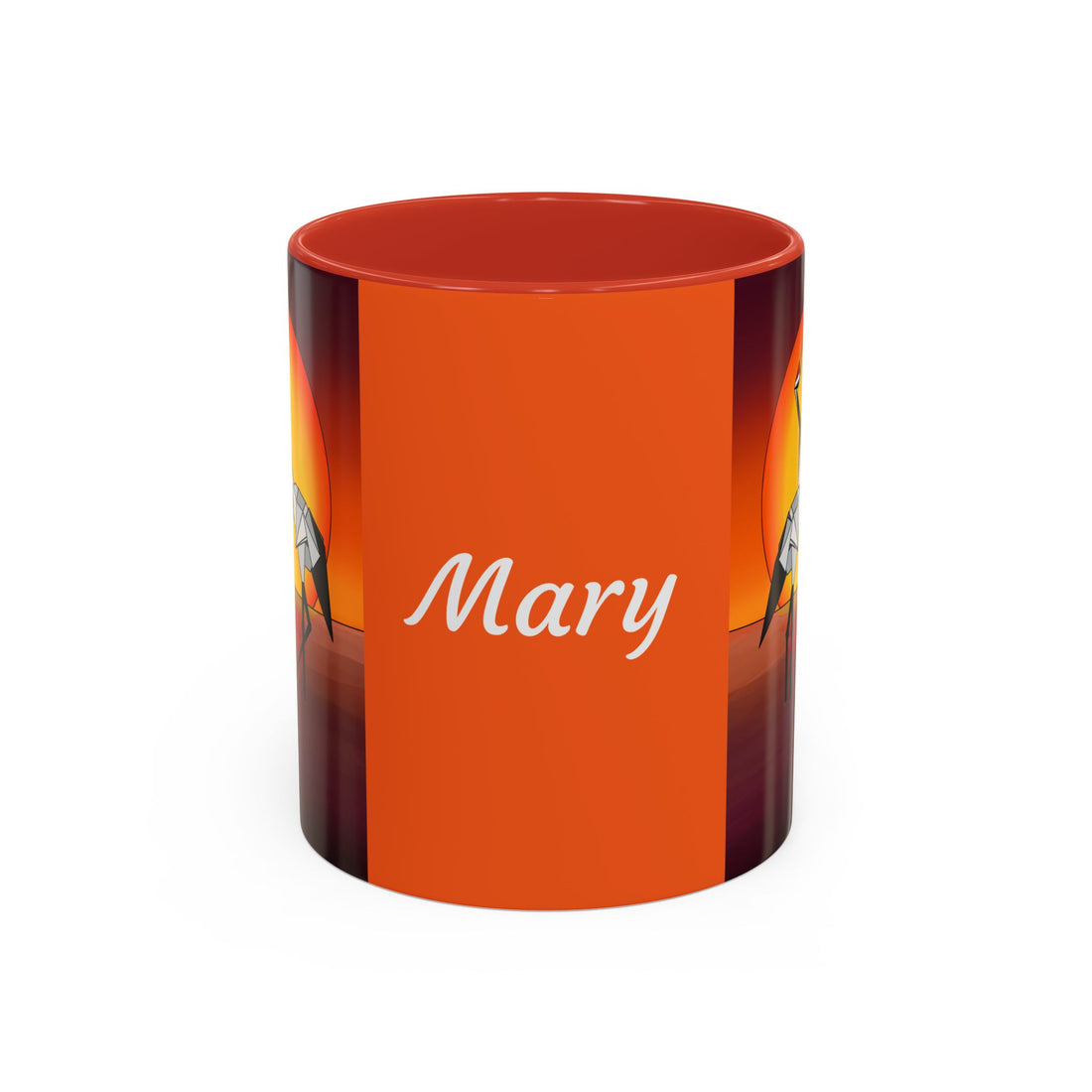 Orange coffee mug with black accents, “Mary” text and origami crane graphic on the sides