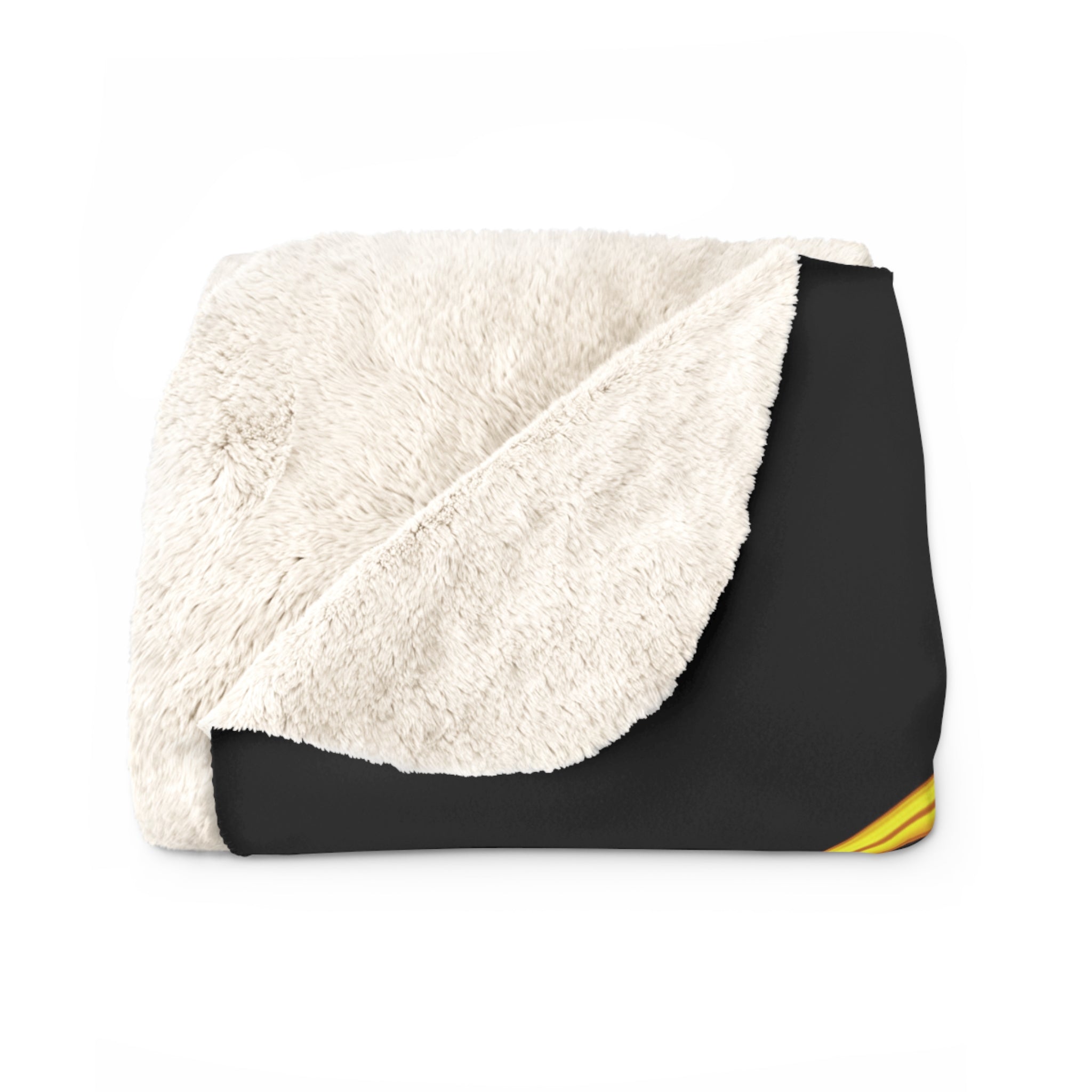 Sherpa fleece throw folded to show off-white plush reverse and black design corner