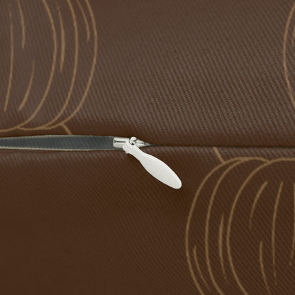 Brown lumbar pillow close-up with tan pumpkin print and visible zipper tab