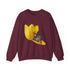 Maroon crewneck sweatshirt with yellow tulip frog graphic and “Say What?!” text