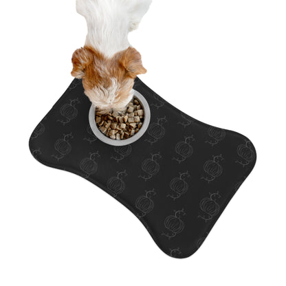 Black pet feeding mat with pumpkin pattern and raised bowl for pet food