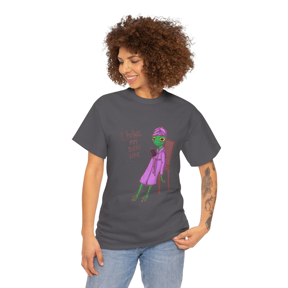 Charcoal graphic T-shirt worn by woman, “Living my Best Life” character print