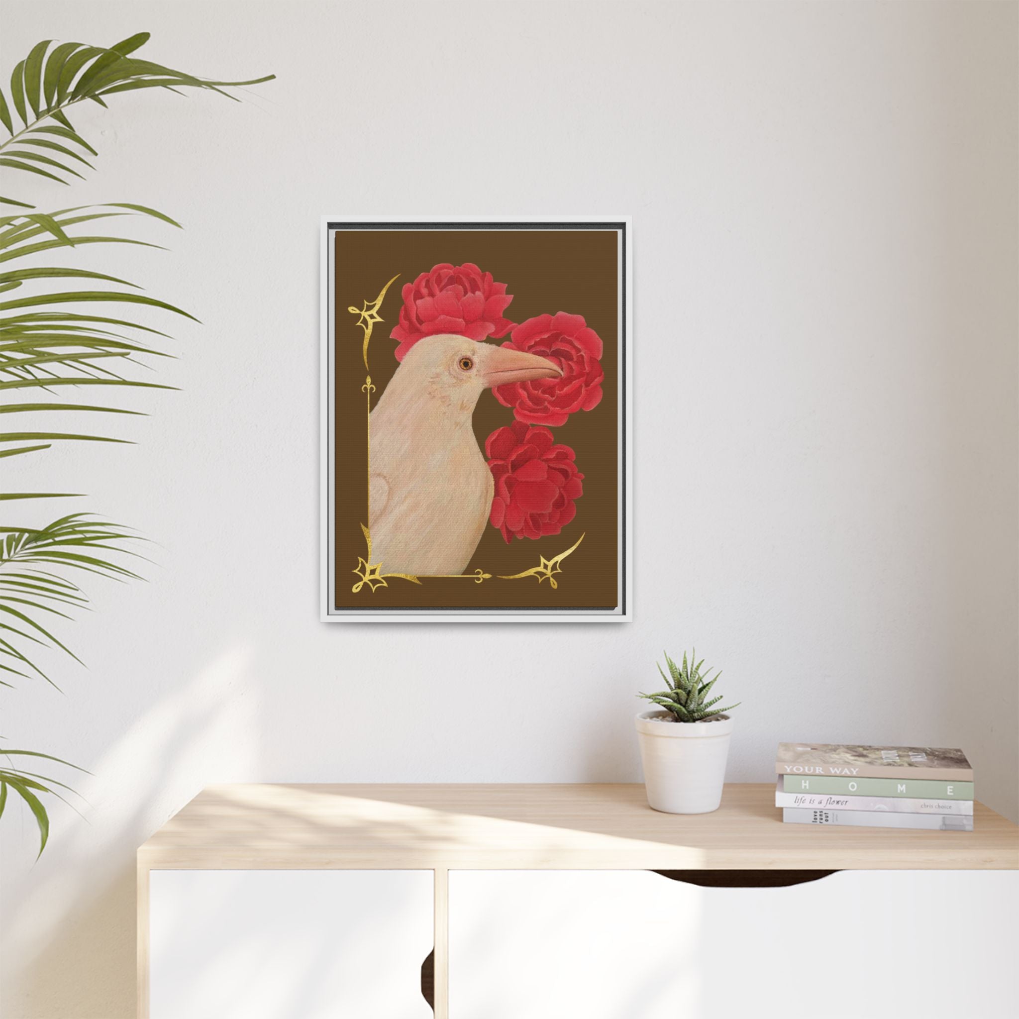Small white framed canvas art print with a white raven and red peonies flowers.