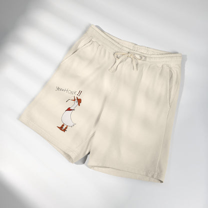 Ivory graphic sweat shorts, folded, with drawstring and cartoon goose print
